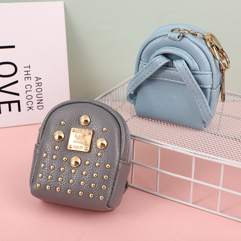 Bolso de las mujeres 2023 nuevo pequeño bolso de La Moneda bolso femenino estudiante todo partido llavero integrado auricular bolsa de la moneda