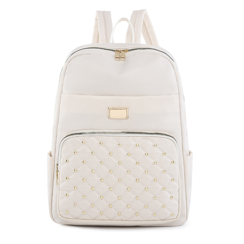 2023 nueva mochila de tela Oxford para mujer casual moda rombo remache mochila ligera mochila de viaje urbano