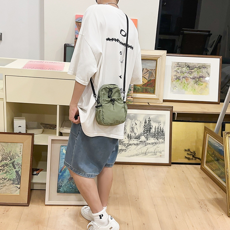 Solid-color nylon fabric bag for women, Spring 2025 new niche waist bag, ins casual pleated phone bag, crossbody bag for women undefined
