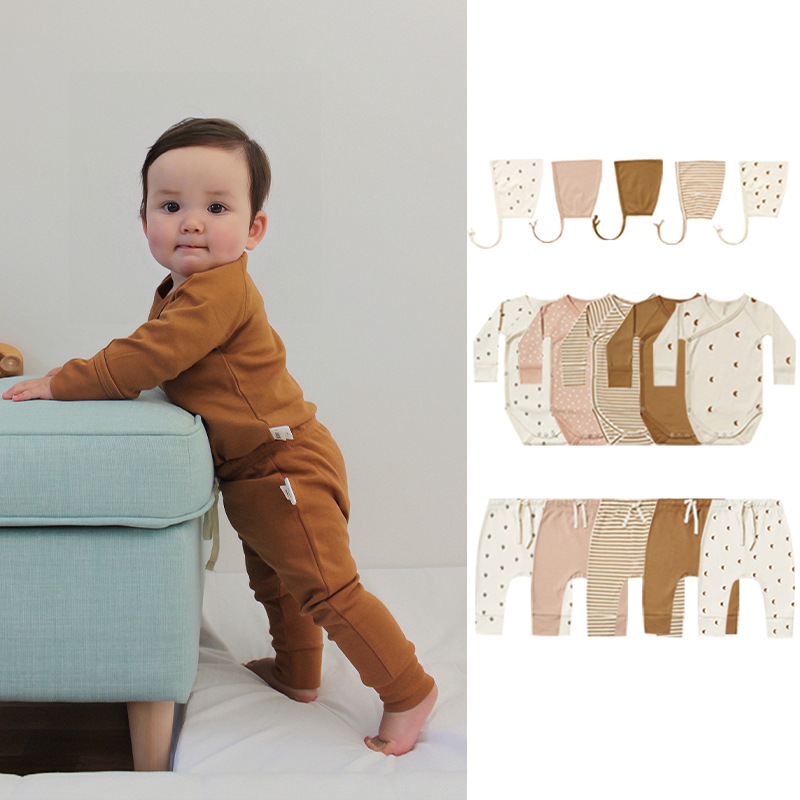 Ropa de bebé europea y americana clase una primavera y otoño hombres y mujeres de manga larga mameluco de algodón diagonal hebilla triángulo mameluco