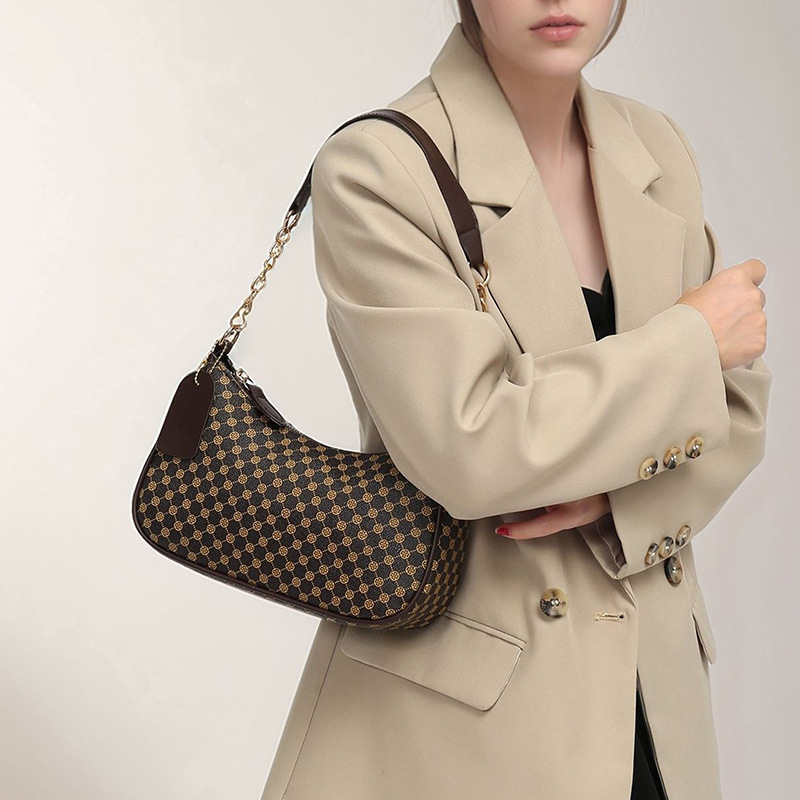 2025 nuevo bolso de mujer nuevo bolso de impresión personalidad bolso de hombro de moda bolso de maquillaje de viaje al comercio exterior lote