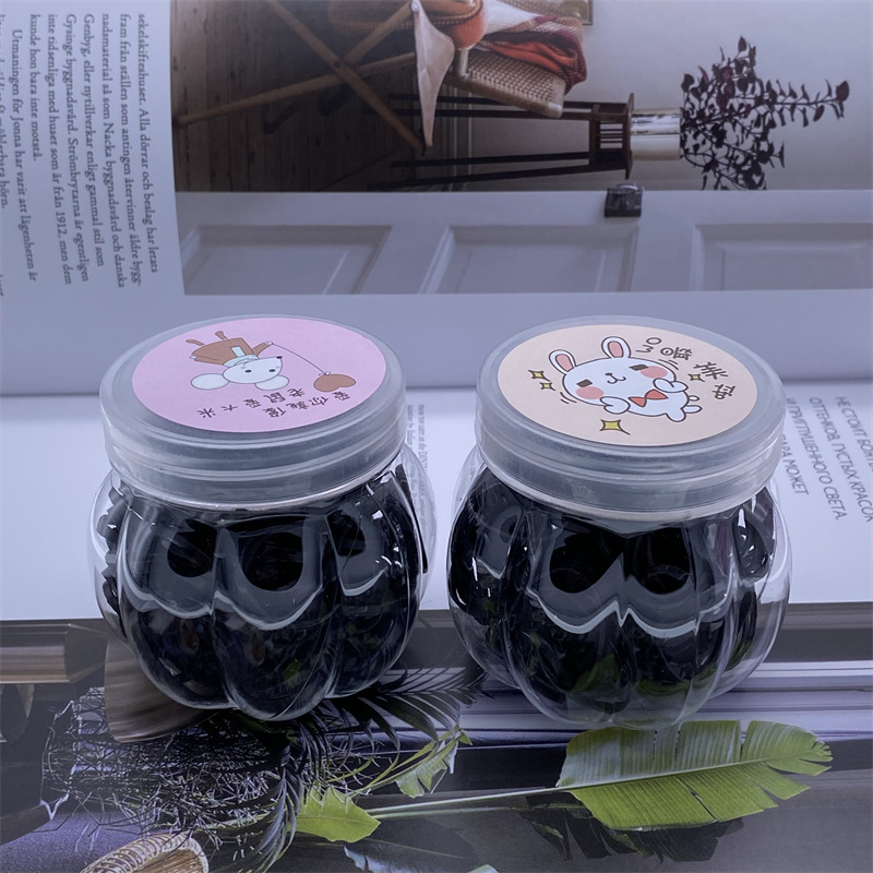 Barrel de calabaza de dibujos animados desechables banda de pelo de los niños banda de goma supermercado tienda física dos yuanes tienda de accesorios de cabeza