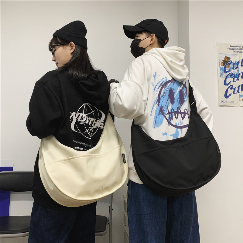 帆布包包女2020上新韓版chic慵懶風休閒寬帶大容量斜挎包簡約百搭