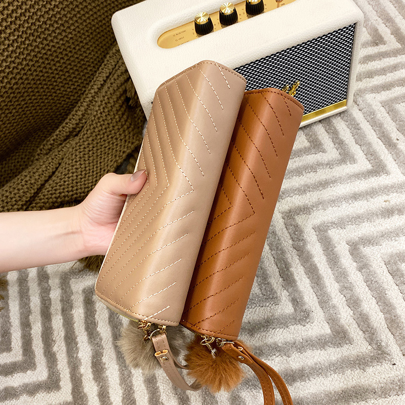 La cartera de las mujeres al por mayor 2022 nueva textura de la moda del embrague del todo-fósforo del bolso de dos monederos doblez de la cartera