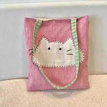 2025新款日系单肩布包百搭简约帆布女包可爱卡通猫咪文艺通勤包包