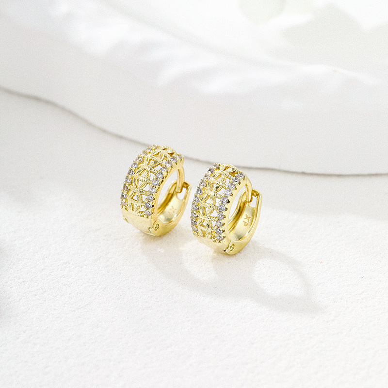 Xuping Europa y los Estados Unidos transfronterizos círculo geométrico perfiles de orejas femeninas hueco diseño micro incrustado aretes de gemas artificiales adornos de orejas fríos