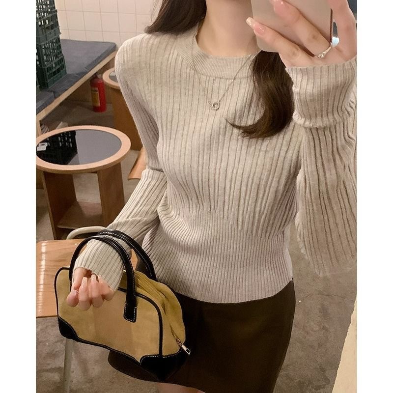 オート麦の色は身を修めてやせているメリヤスの底のシャツを現します。