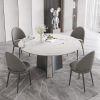 Italian rock plate round table dining table light luxury modern minimalist high -end high -end stainless steel designer bright light rock board table