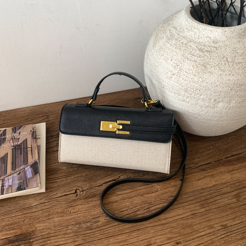 Cross-border retro bolsos europeos y estadounidenses mujeres 2026 nuevo nicho super caliente Kelly bolsa de viaje ocio mochila pequeña