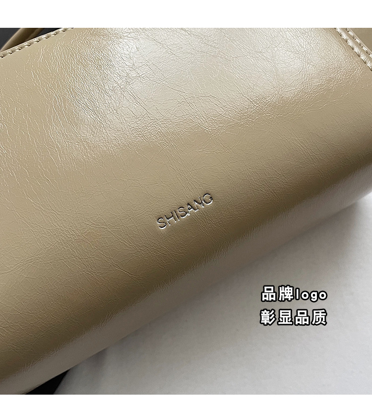 The 2024 new women's single-shoulder underarm bag is a simple and elegant commuting bag with a Korean-style niche design sense. It's a small square bag undefined