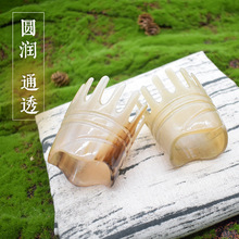 厂家批发真正白水牛角按摩梳子宽齿头部经络洗头刷头疗防脱发圆筒