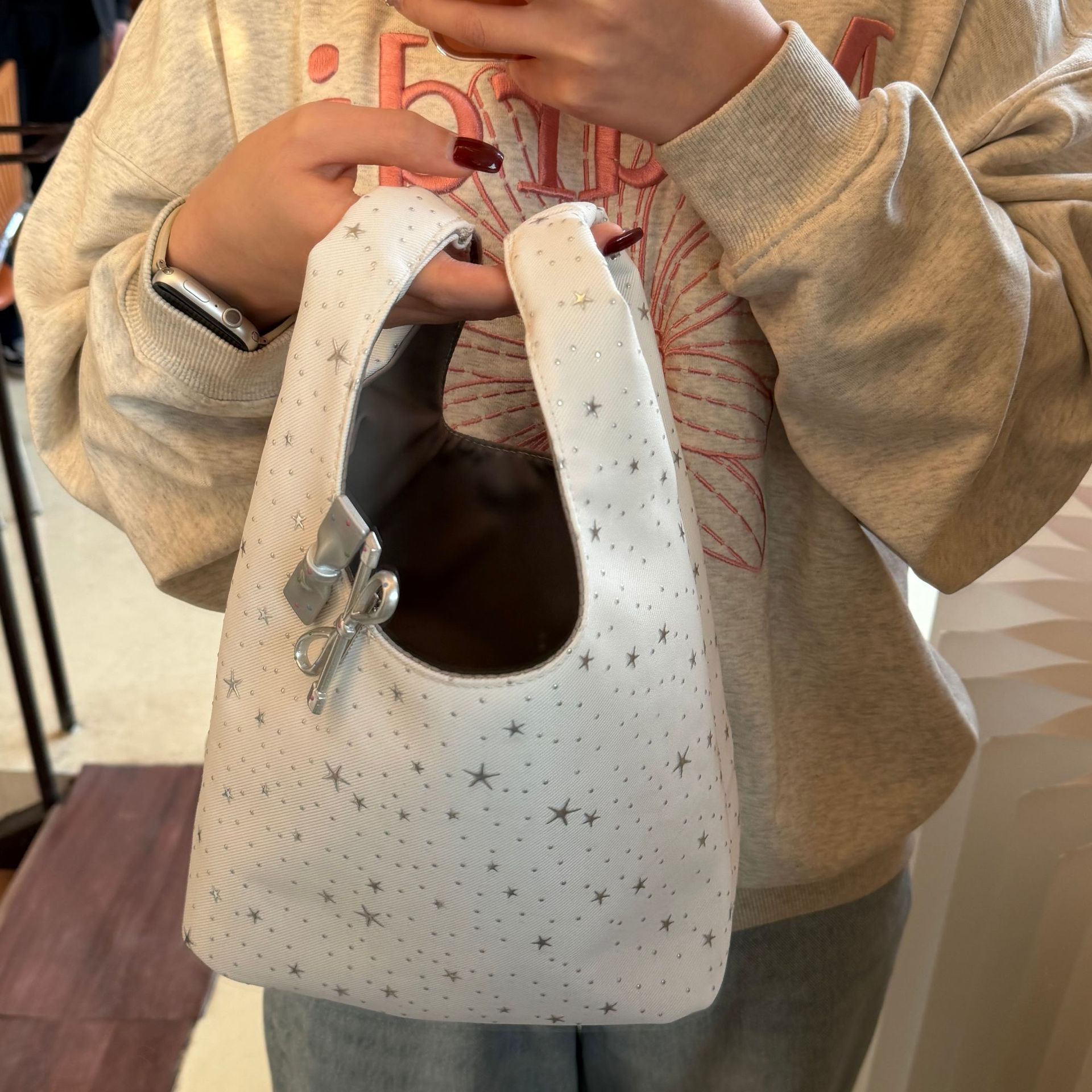 Coreano de alta calidad sensación de estrellas bolso de mano simple de viaje versátil bolsa de almacenamiento para el trabajo misceláneos bolso de cubo de mano para chicas