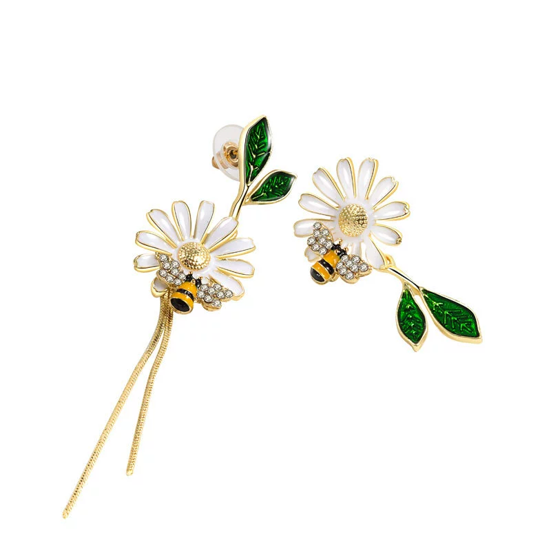 Design asymmetrical earrings, trend of season, flowered