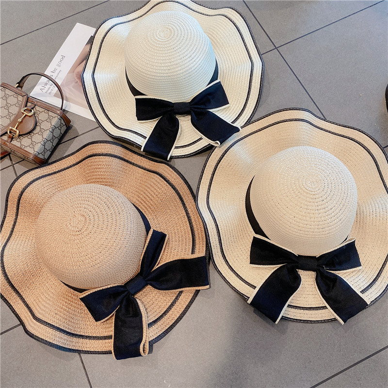 Women's Simple Style Bow Knot Big Eaves Straw Hat display picture 1