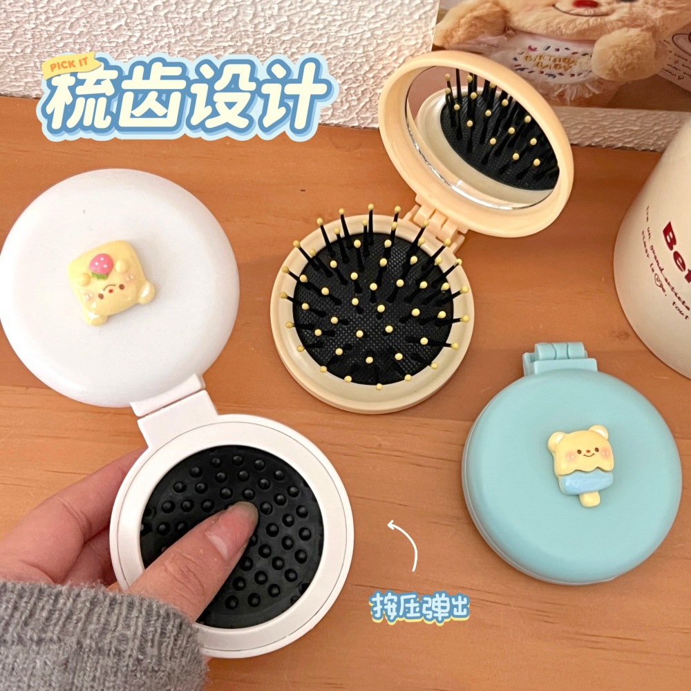 Caricatura encantadora oso plegable un solo espejo pein de corazón de niña portátil mini pequeño espejo de maquillaje de aire pantalon