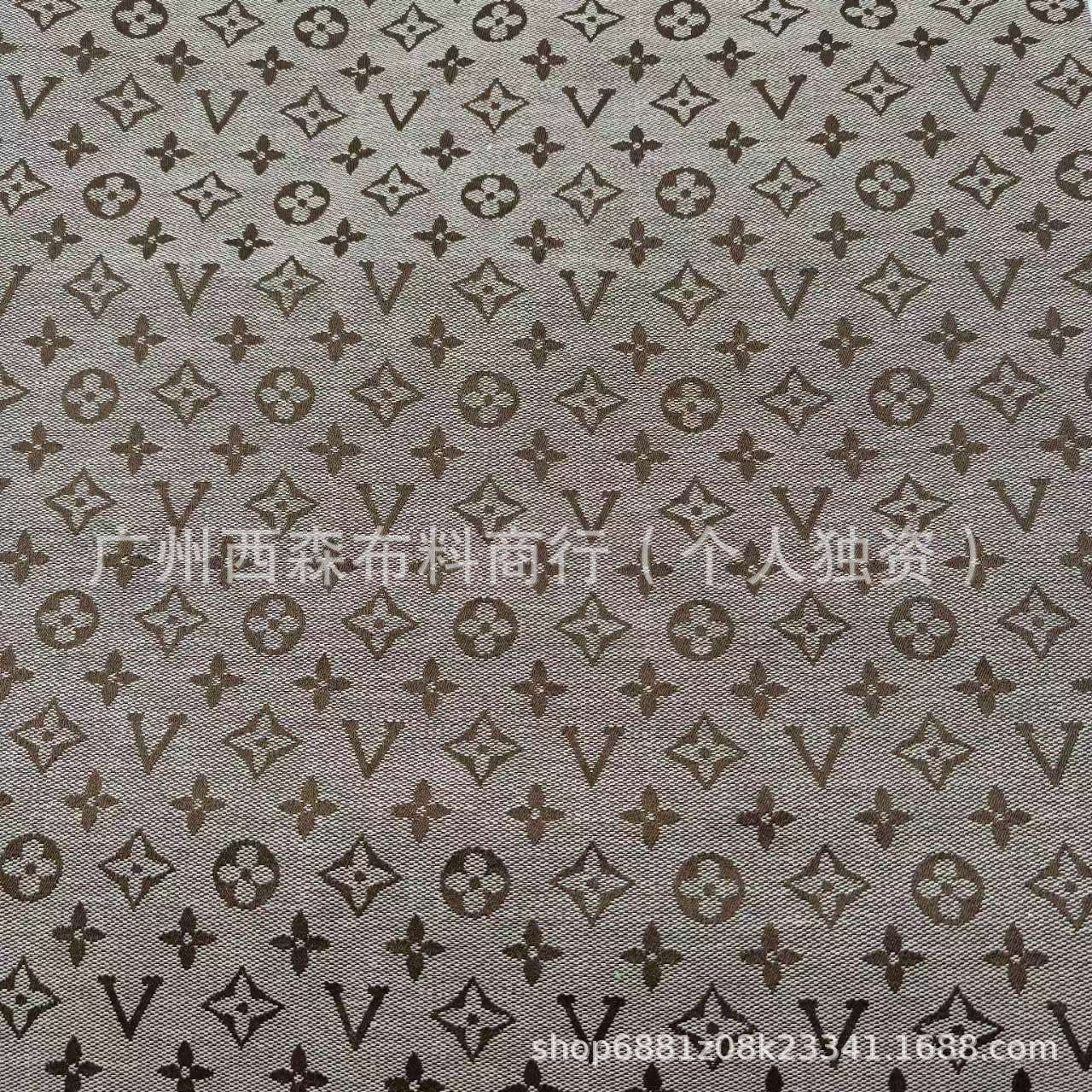 工厂新款提花面料棋盘格V字母爱心辅料外套服装连衣裙布料批发辅