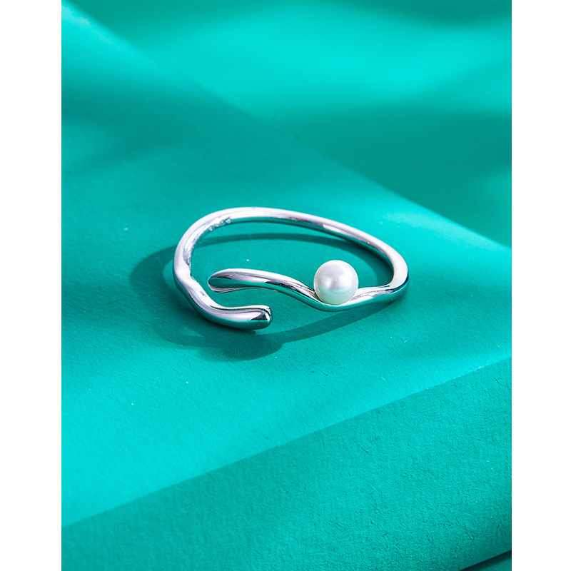 S925 anillo de perlas de plata esterlina personalidad abierta femenina diseño de nicho de moda Otoño e Invierno luz anillo de lujo personalidad estilo de moda
