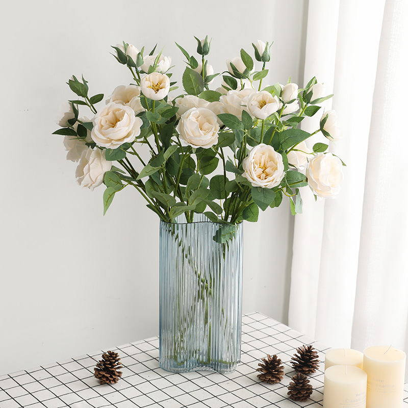 Accent pieces for the living room and entranceway: simulated white multi-headed roses, fake flowers; wedding ceiling decoration: simulated four-headed Alberro roses