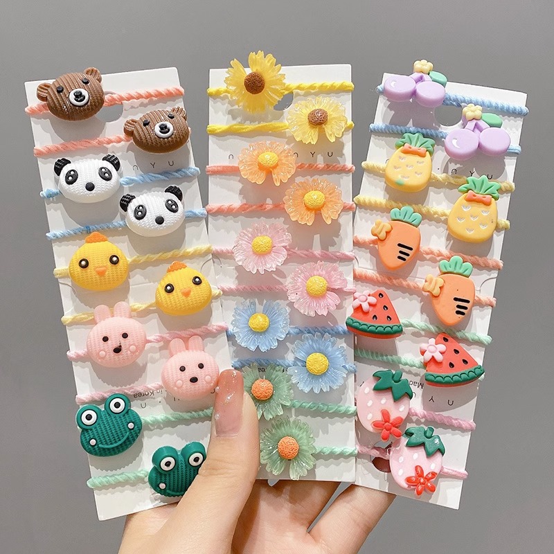 La cuerda del pelo del bebé de las muchachas de la banda de goma de los niños no lastima el pelo Los accesorios del pelo del pulgar del tamaño pequeño atan la banda de goma del pelo