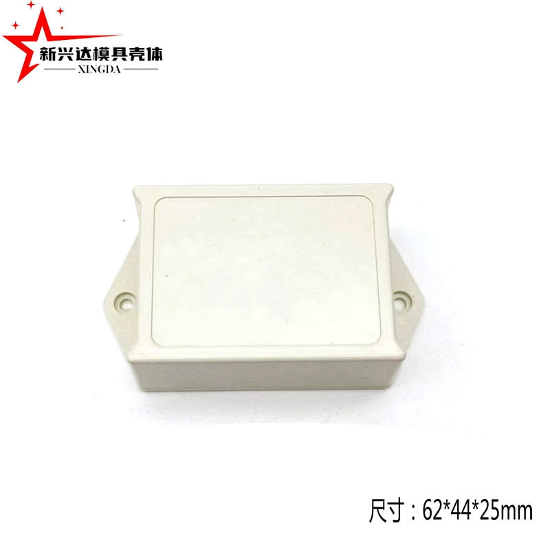 Корпус для сенсорной кнопки с креплением в форме уха, материал корпуса — пластик, защелкивающийся.