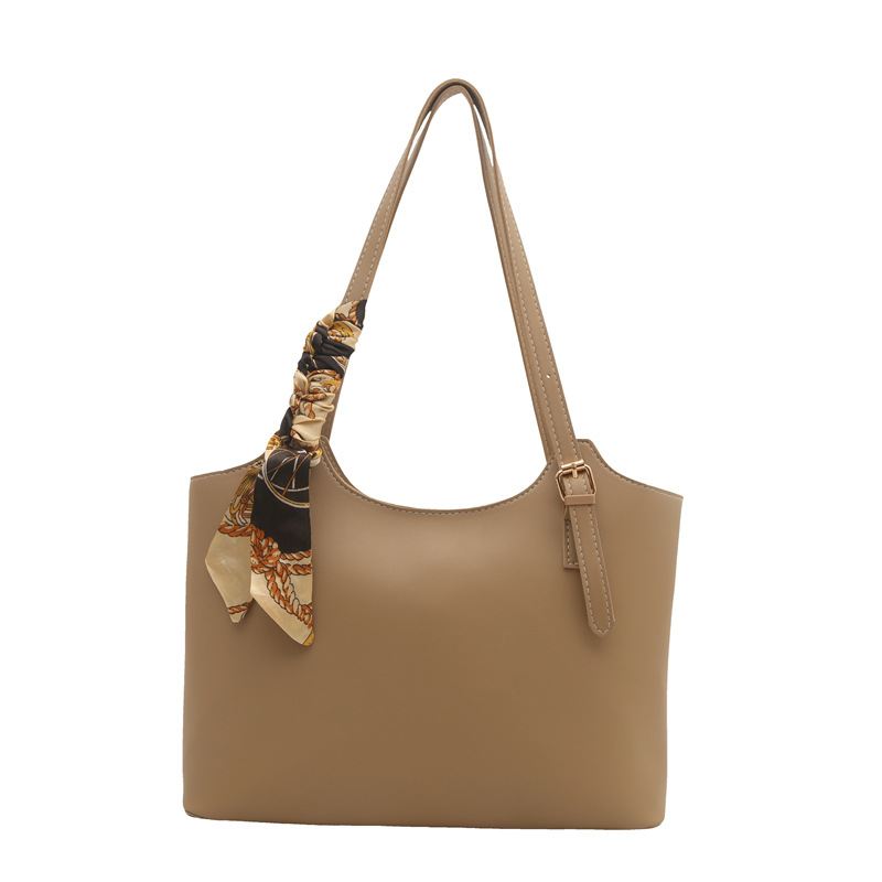 Bolso de mujer de un solo hombro de gran capacidad de textura retro 2025 primavera nuevo bolso de mujer de un solo hombro de todo fósforo