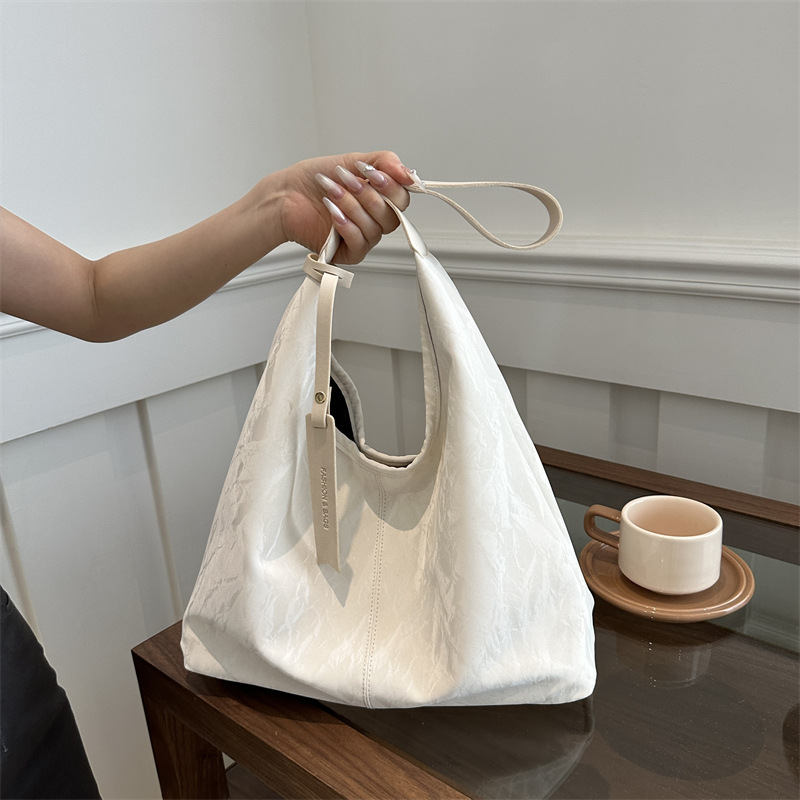 Bolsa de estilo extranjero para mujeres, primavera y verano 2024, nueva bolsa de hombro de dama versátil, bolsa de estilo coreano de alta calidad para mujeres