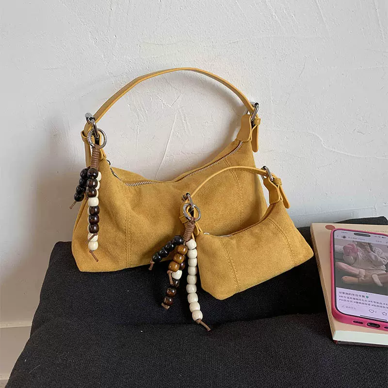 复古麂皮绒手拎小包包女士2025新款小众时尚饺子包通勤单肩斜挎包