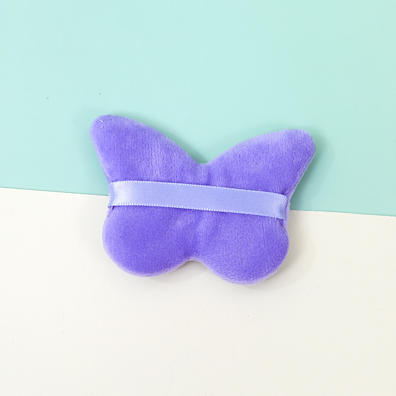 La borla de flocado corto en forma de mariposa transfronteriza no come polvo esponja de terciopelo de pie polvo suelto maquillaje maquillaje maquillaje algodón fábrica personalizado al por mayor