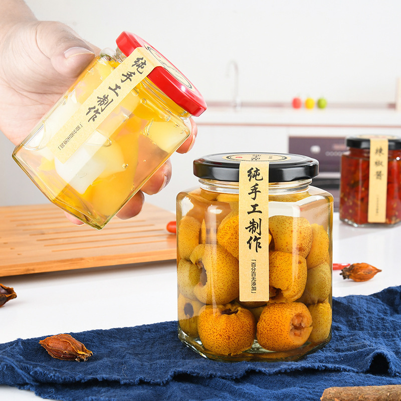 批发六棱蜂蜜瓶密封玻璃果酱瓶家用带盖辣椒酱菜瓶透明玻璃罐头瓶