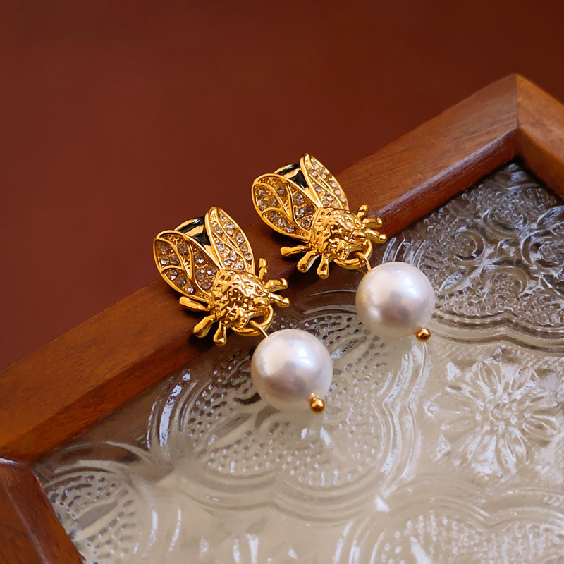 Pendientes exagerados de vintage medieval Pendientes de perlas geométricas de aceite de gota de diamantes de aguja de plata femenina Pendientes retro de sentido avanzado