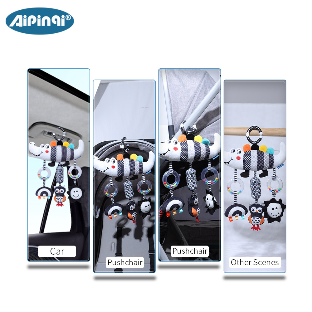 Aipinqi nuevo bebé blanco y negro campana de viento animal 0 - 3 años cocodrilo bebé juguetes de peluche al por mayor en stock