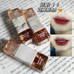 HERORANGEは軽くて濃くて、鏡面の唇の釉薬の水の光がぶうぶうとしています。