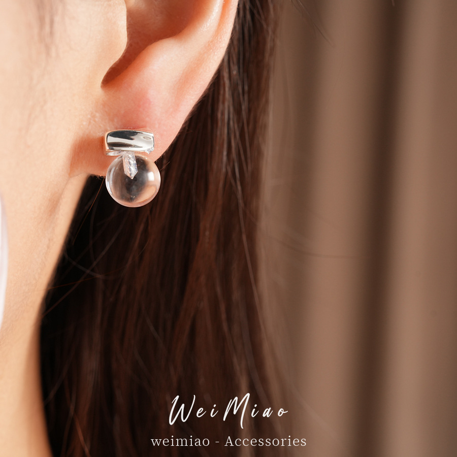 Aguja de plata resina aretes redondos minimalistas estilo diario viaje versátil pendientes ligeros de lujo alta sensación auriculares al por mayor