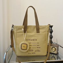 字母印花帆布单肩包包女休闲中学生书包大容量托特包斜挎通勤包