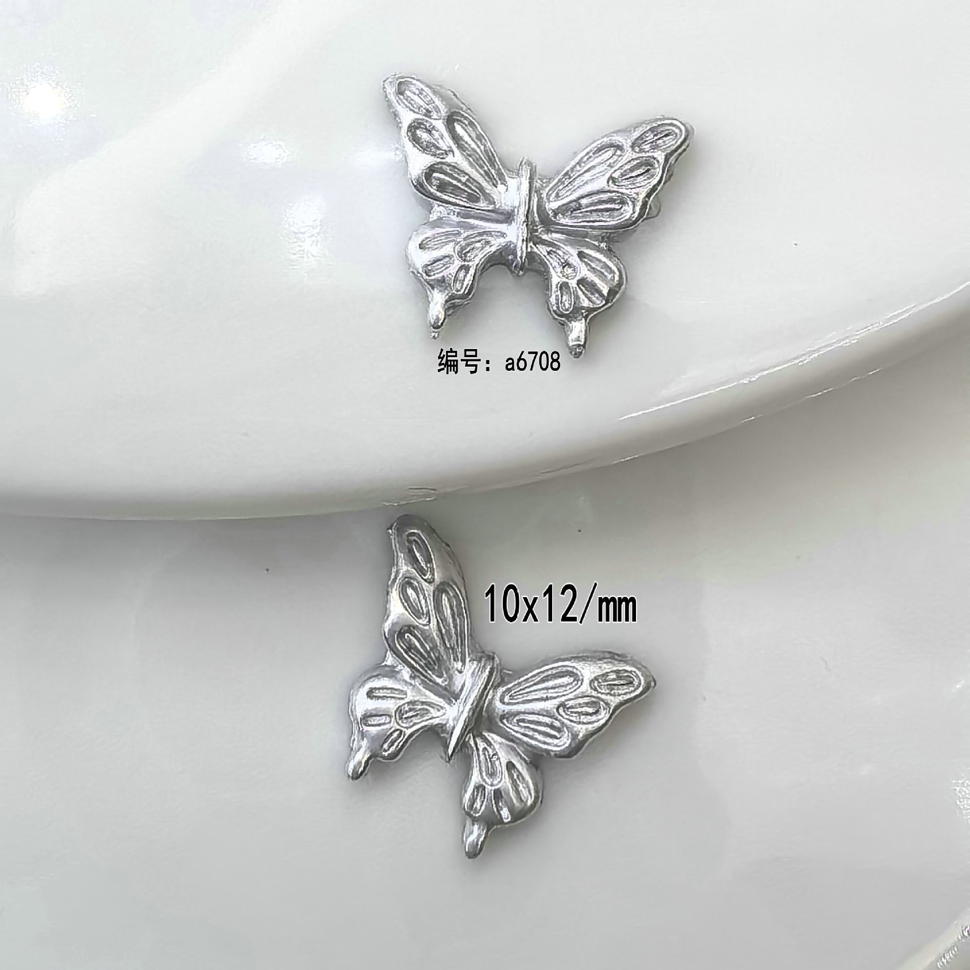 大量现货银色蝴蝶美甲饰品轻奢立体蝴蝶结金属大蝴蝶翅膀指甲钻饰