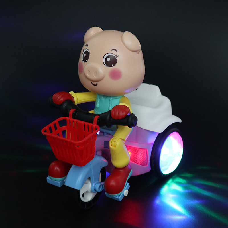 TikTok con música genial magnífico truco ligero giratorio pequeño Triciclo de cerdo lindo puesto de coche de juguete eléctrico para niños