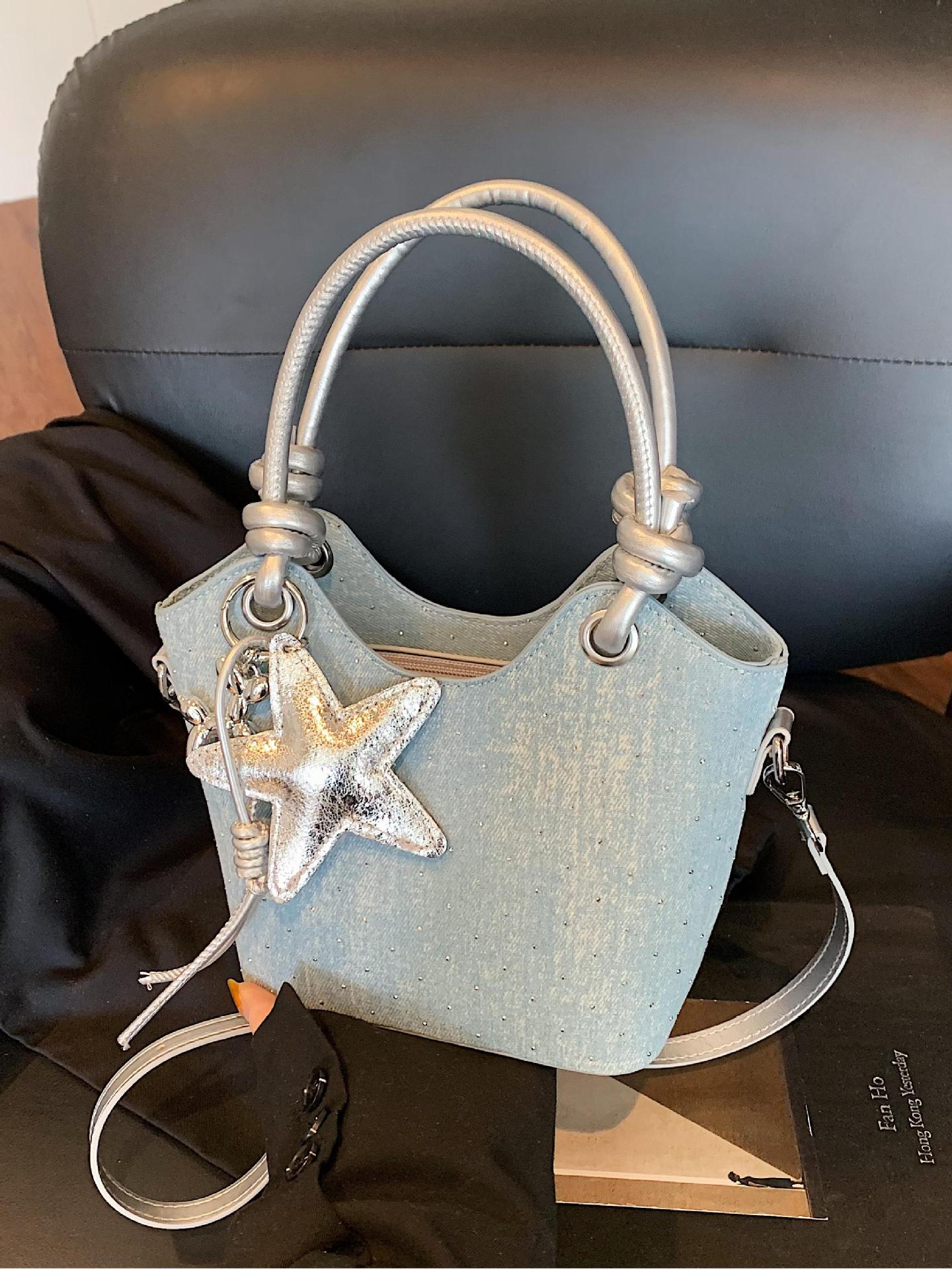 Bolsa de mano de moda coreana de estilo extranjero, bolso de mano de mujer, verano 2025, nuevo estilo universal, bolso de cubo de moda, bolso de hombro de viaje