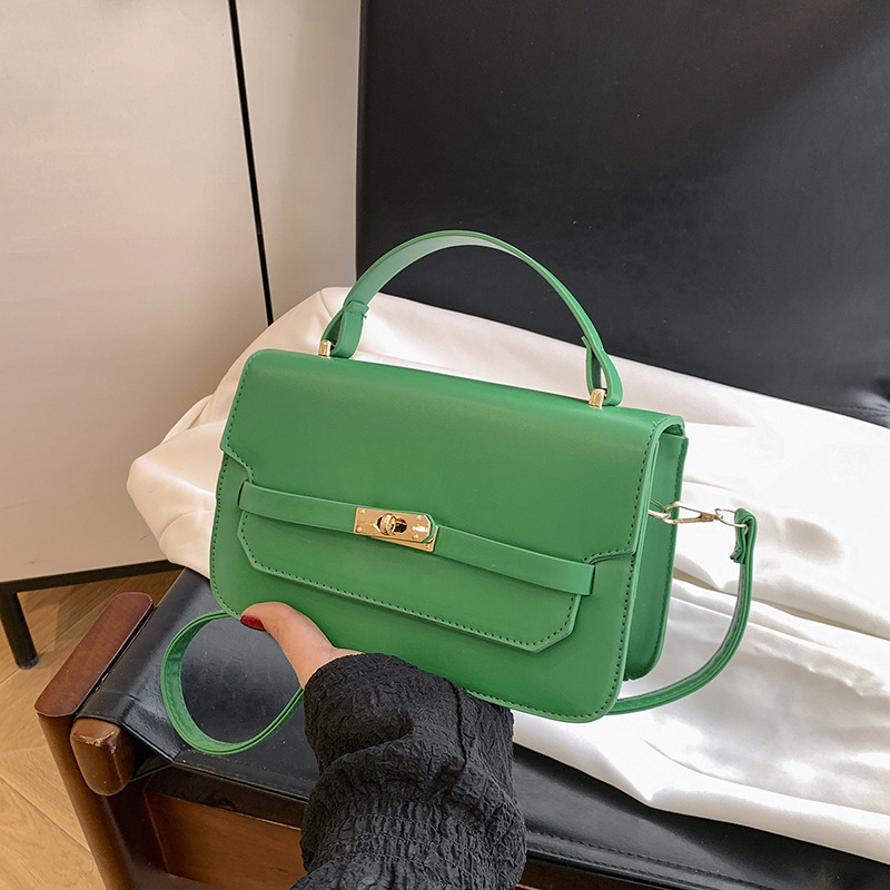 Bolso de mano de color sólido nuevo estilo 2025 simple bolso de hombro de primavera coreano de moda con cierre bolso pequeño