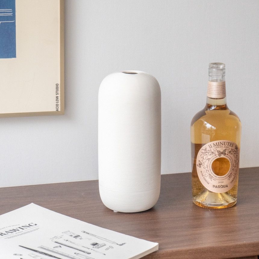 Nuevo chino cerámica florero decoración del hogar artesanía moderna simple Zen blanco flor titular de la flor al por mayor