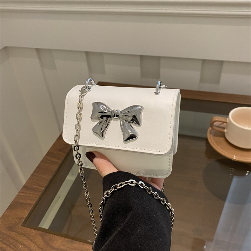 Bolsa de hombro de cadena sólida coreana de textura extranjera simple 2025 verano nuevo mini bolso cuadrado bolso de mujer