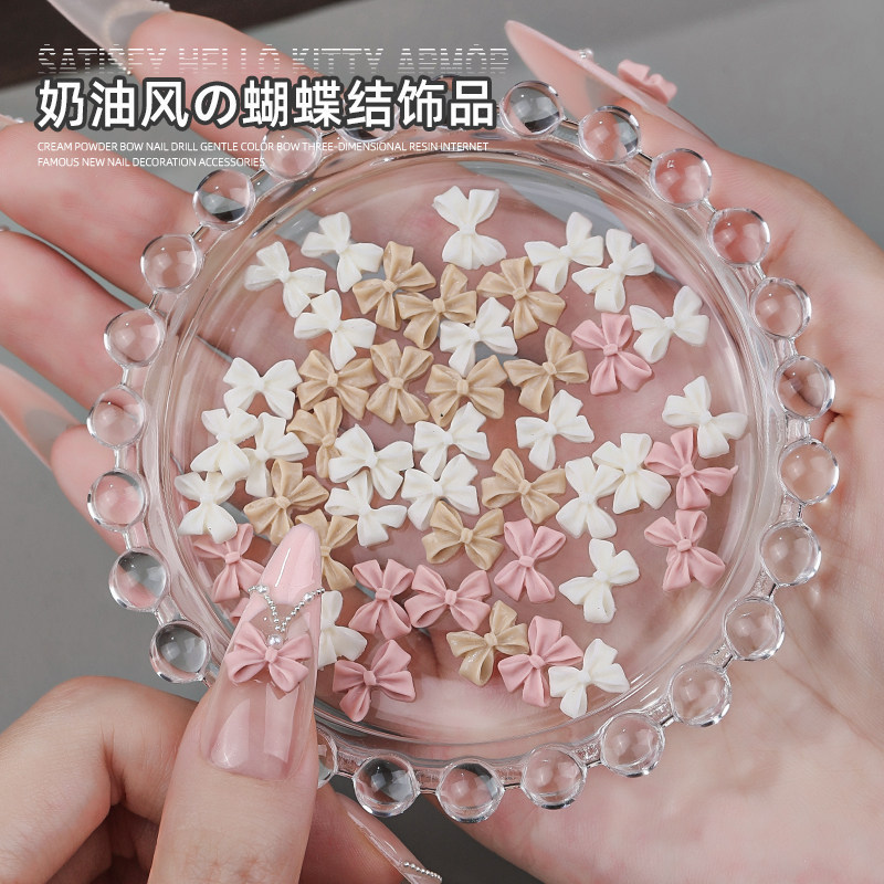 Cream-style bow nail art accessories, resin flat-bottomed rhinestones, three-dimensional bows in white and pink, wholesale nail art accessories Cream-style bow nail art accessories, resin flat-bottomed rhinestones, three-dimensional bows in white and pink, wholesale nail art accessories