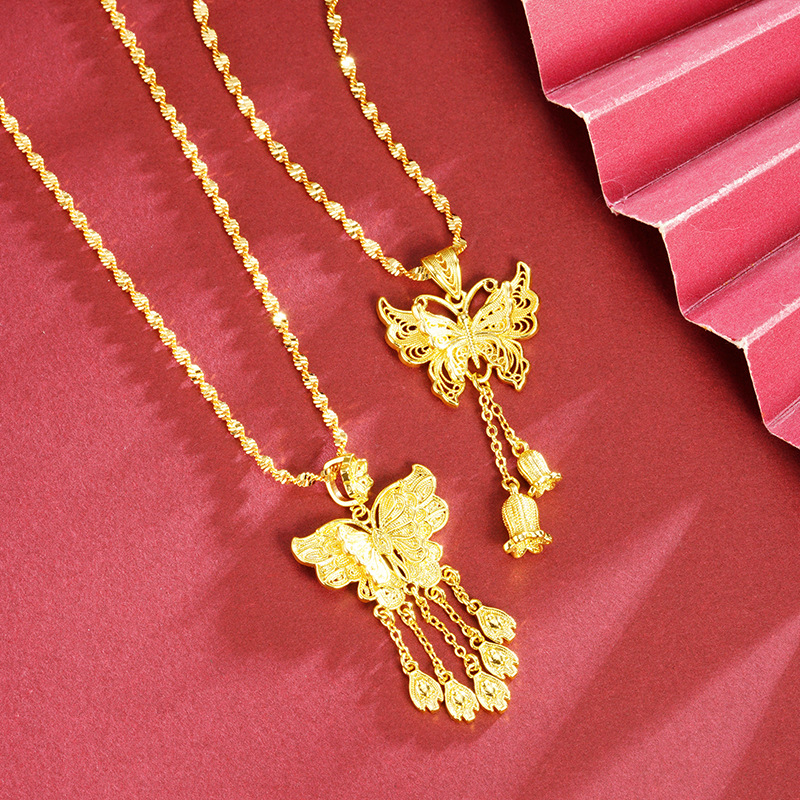 Nuevo colgante de oro de arena antiguo chino estilo palacio mariposa lirio de los valles borla colgante niña durante mucho tiempo joyería al por mayor