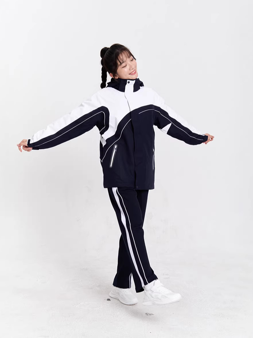 Uniforme escolar de Shenzhen estudiantes de secundaria Teflon versión 3 en 1 chaqueta de asalto manga larga abrigo de tela de tres protecciones revestimiento desmontable