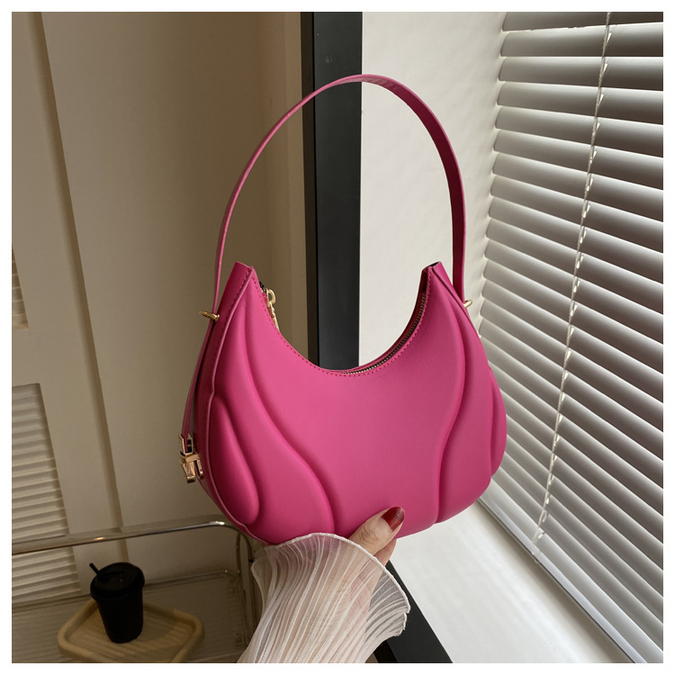 2023 spring and summer new fashion indentation portable shoulder underarm dumpling bag women's bag support a large number of wholesale mixed batch