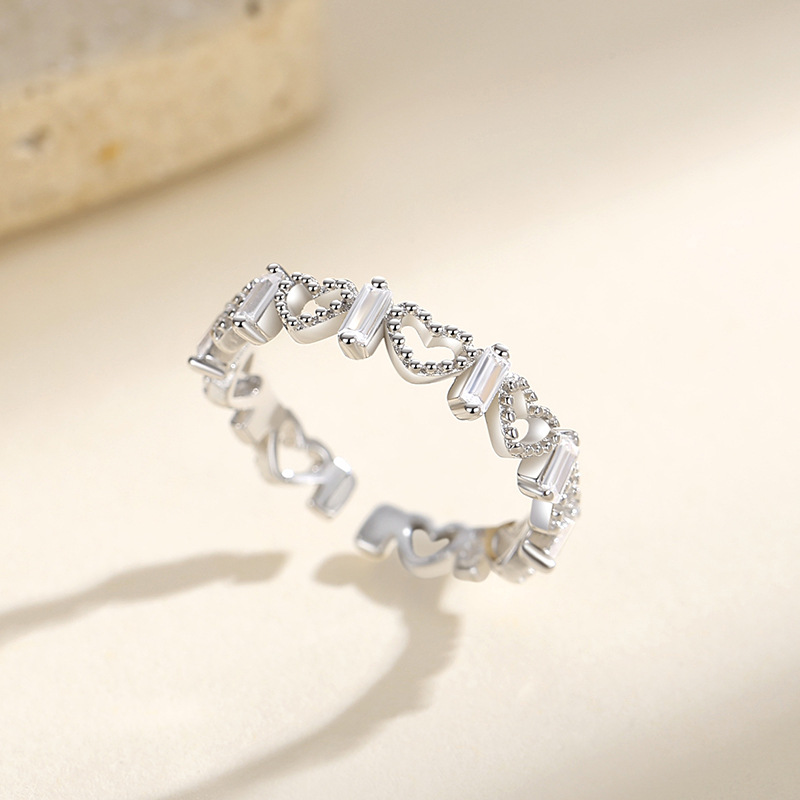Anillo de diseño de nicho de mujer s925 plata esterlina estilo coreano anillo de diamante de corazón hueco estilo de lujo ligero de moda TikTok mismo estilo