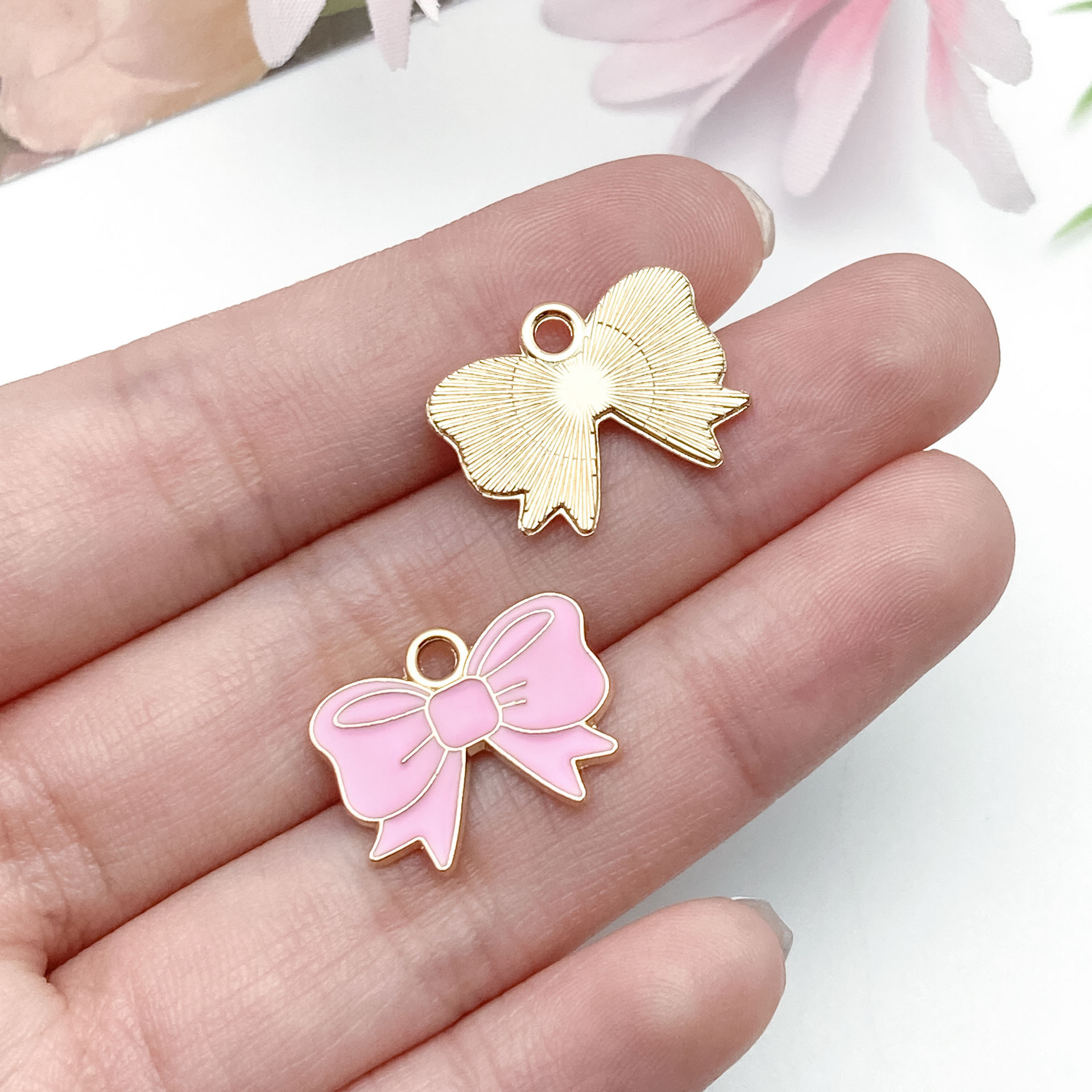 23243-J-滴油粉色锌合金蝴蝶结领结14x18mm-1g