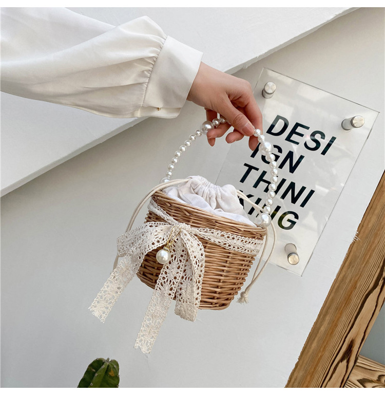 Fashion Round Straw Pearl Portable Bag display picture 41