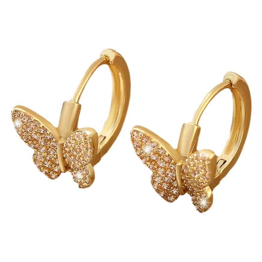 Venta caliente europea y americana elegante moda cobre con incrustaciones de circonio mariposa oído anillo nicho diseño roto capullo oreja hebilla pendientes mujer fábrica al por mayor