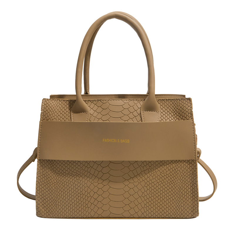 Nicho de moda simple de viaje de hombro mochila para mujeres 2026 esta temporada nuevo estilo retro bolso de mano versátil