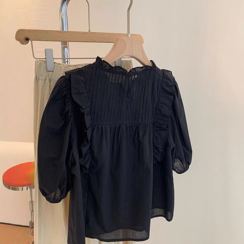 Black shirt with loose pleated ruffles, doll-style top—summer new arrival, forest-inspired solid color, sweet short-sleeved, niche design that won’t clash with others.